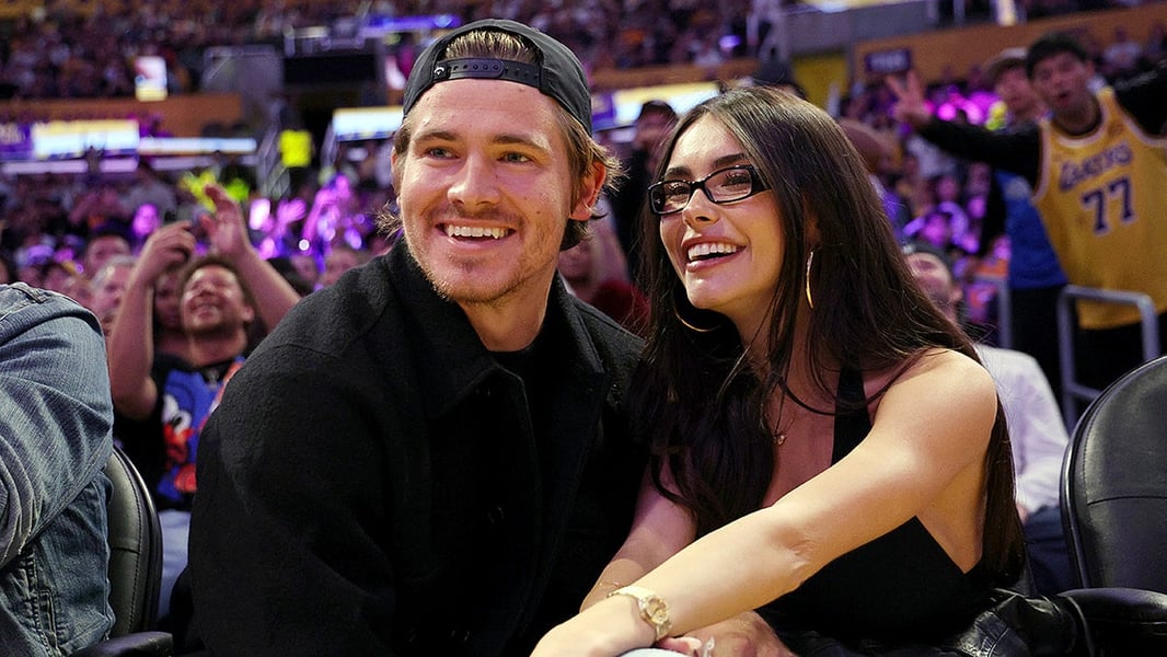 Madison Beer and Justin Herbert courtside at a Lakers game October 2025