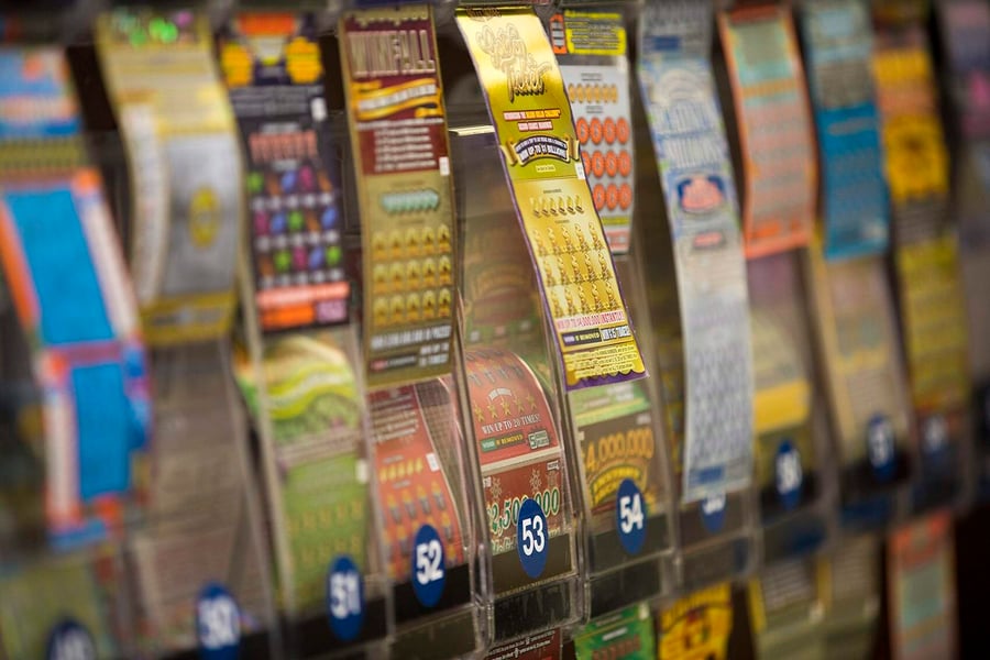 Massachusetts Lottery tickets at a Boston convenience store with Mass Lottery Online platform launch July 2026