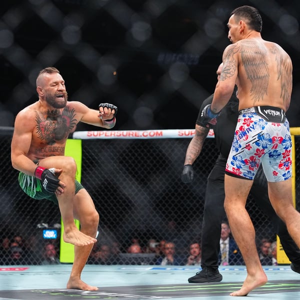 Max Holloway defeats Conor McGregor by TKO as referee Mike Beltran stops the UFC 329 main event
