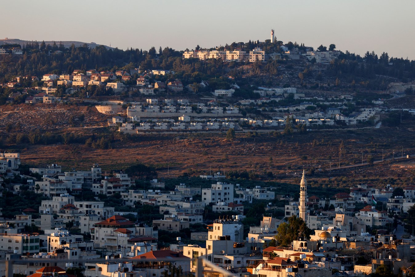 Palestinian village of Turmus Aya north of Ramallah with Israeli settlement Shilo visible in background, as Netherlands bans settlement imports