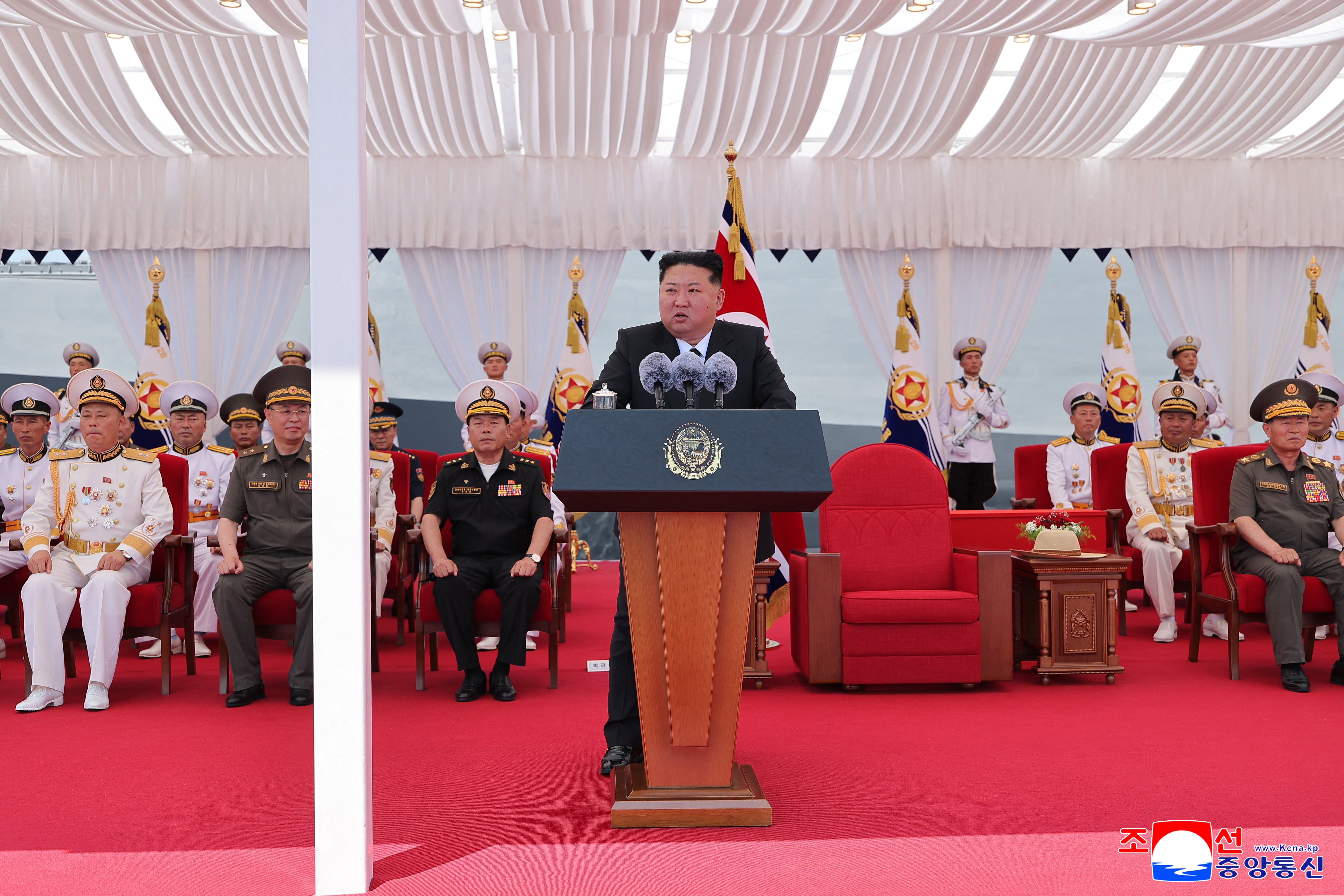 Kim Jong Un at the commissioning ceremony of North Korea's first guided-missile destroyer the Choe Hyon at Nampho port