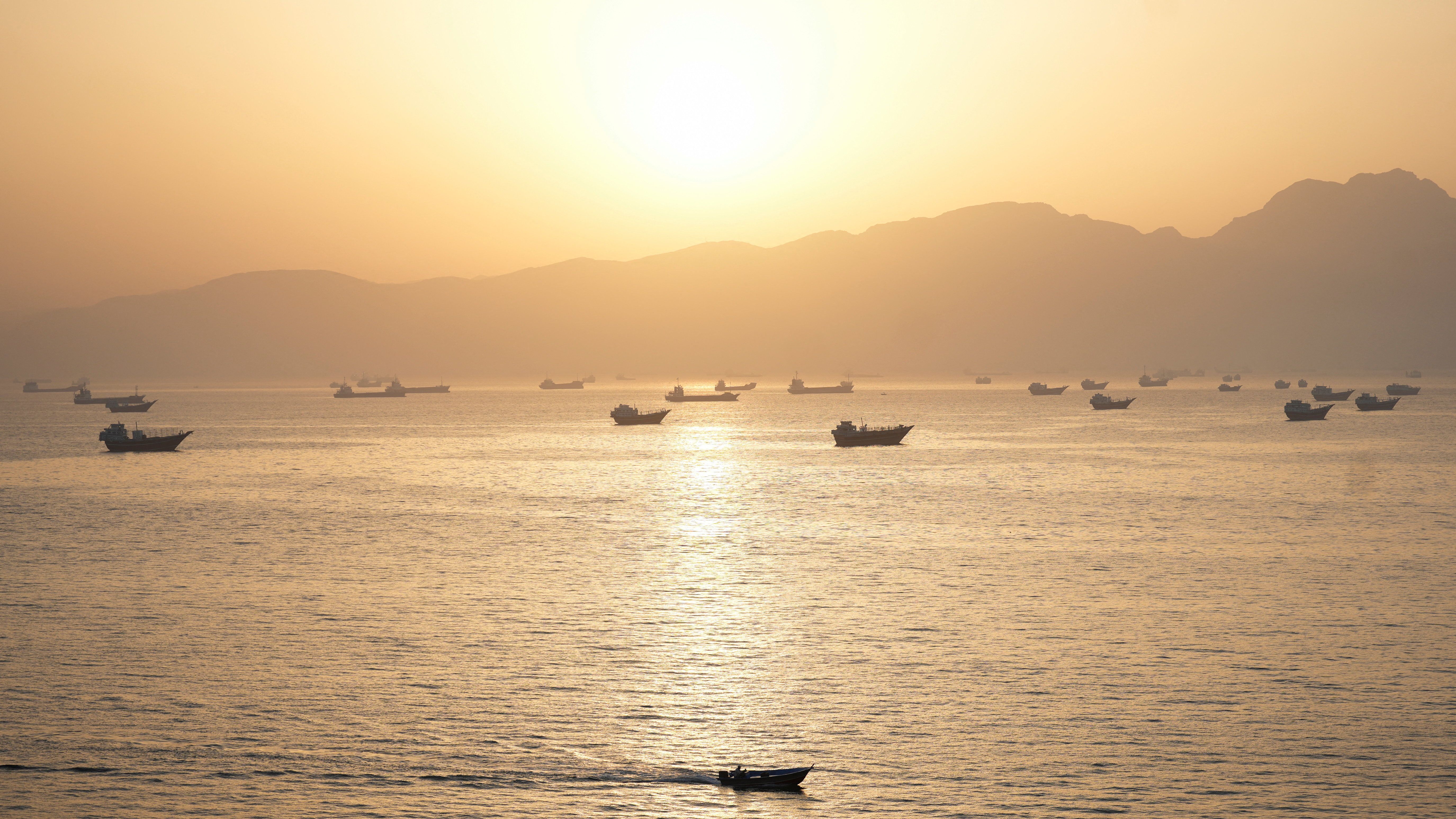 Oil tankers transit the Strait of Hormuz as Brent crude falls to its lowest since the Iran war began