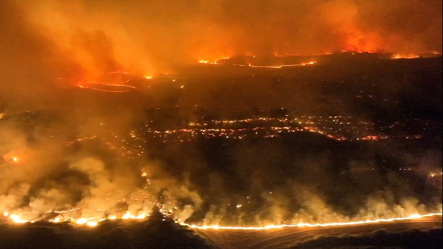 Night view of the Ores wildfire in Zaragoza province Spain burning through the night of July 18-19 2026