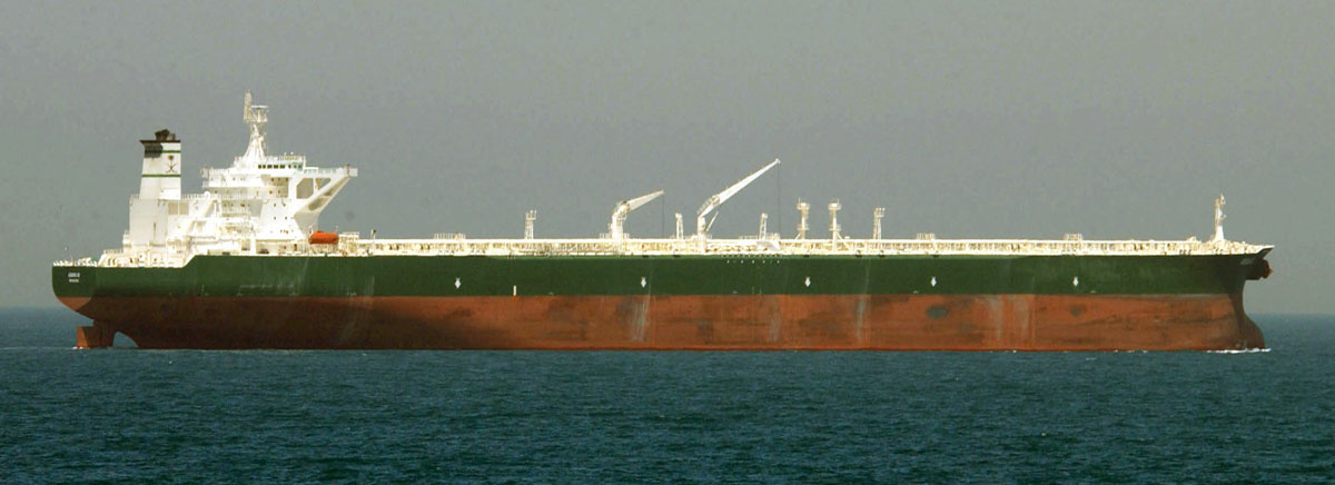US Navy oil supertanker AbQaiq at sea representing shipping disruptions in the Strait of Hormuz amid US-Iran conflict