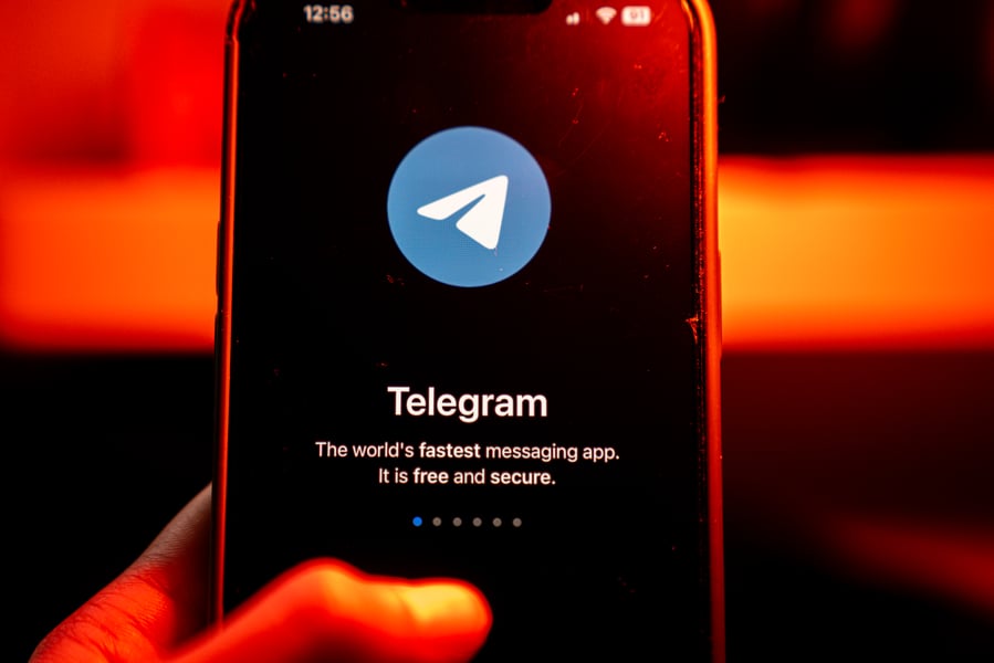 Telegram and Signal messaging app logos on a smartphone as India MeitY sends notices over username features