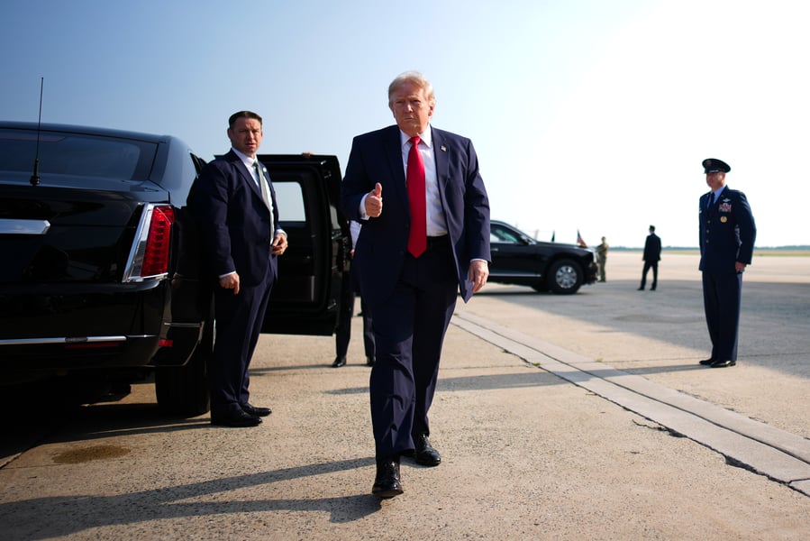 President Donald Trump speaks to reporters before boarding Air Force One at Joint Base Andrews