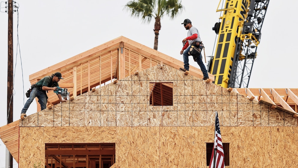 Construction workers rebuilding homes in Pacific Palisades California June 2026 US labor market