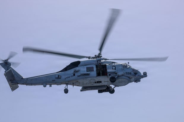US Navy MH-60S Seahawk helicopter operating from USS George H.W. Bush during Operation Epic Fury in Arabian Sea