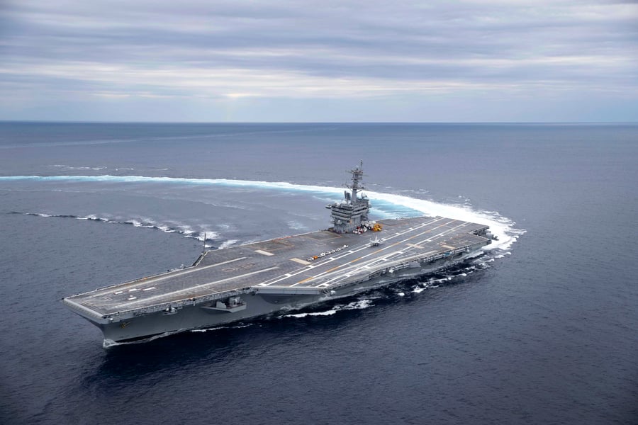 USS Abraham Lincoln CVN-72 aircraft carrier underway at sea, part of the US naval presence in the Persian Gulf region