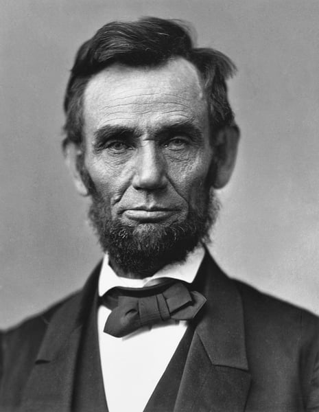 Abraham Lincoln photographed in February 1865, visibly gaunt and lined after four years of civil war