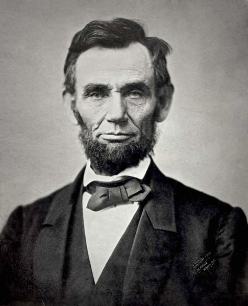 Abraham Lincoln in a bow tie and dark coat, photographed by Alexander Gardner on 8 November 1863