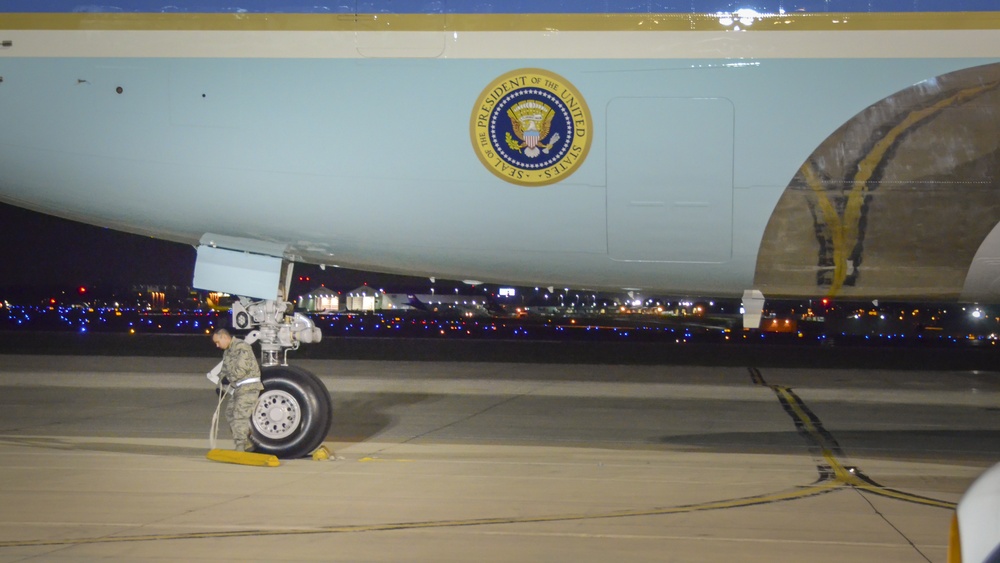 Air Force One crew member on the tarmac, the aircraft that served as a decoy during Trump's secret evacuation from NATO Ankara summit