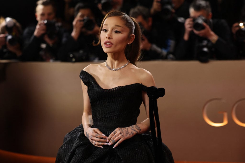 Ariana Grande poses on the red carpet at the 83rd Annual Golden Globes in Beverly Hills California January 2026