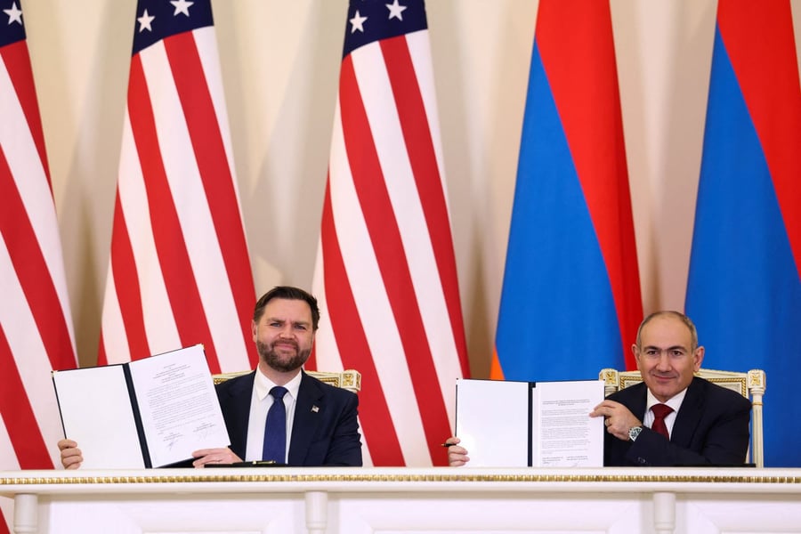 Nikol Pashinyan and JD Vance hold signed copies of the Armenia-US civil nuclear agreement in Yerevan