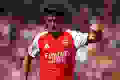 Christos Tzolis in action for Borussia Dortmund against Arsenal at Emirates Cup 2026