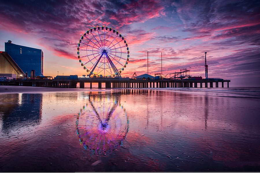 Atlantic City boardwalk and Steel Pier with summer beach crowds