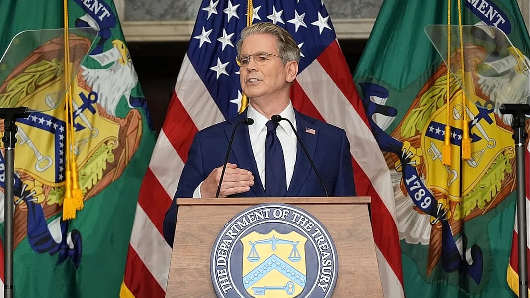 US Treasury Secretary Scott Bessent speaking at a Treasury Department podium