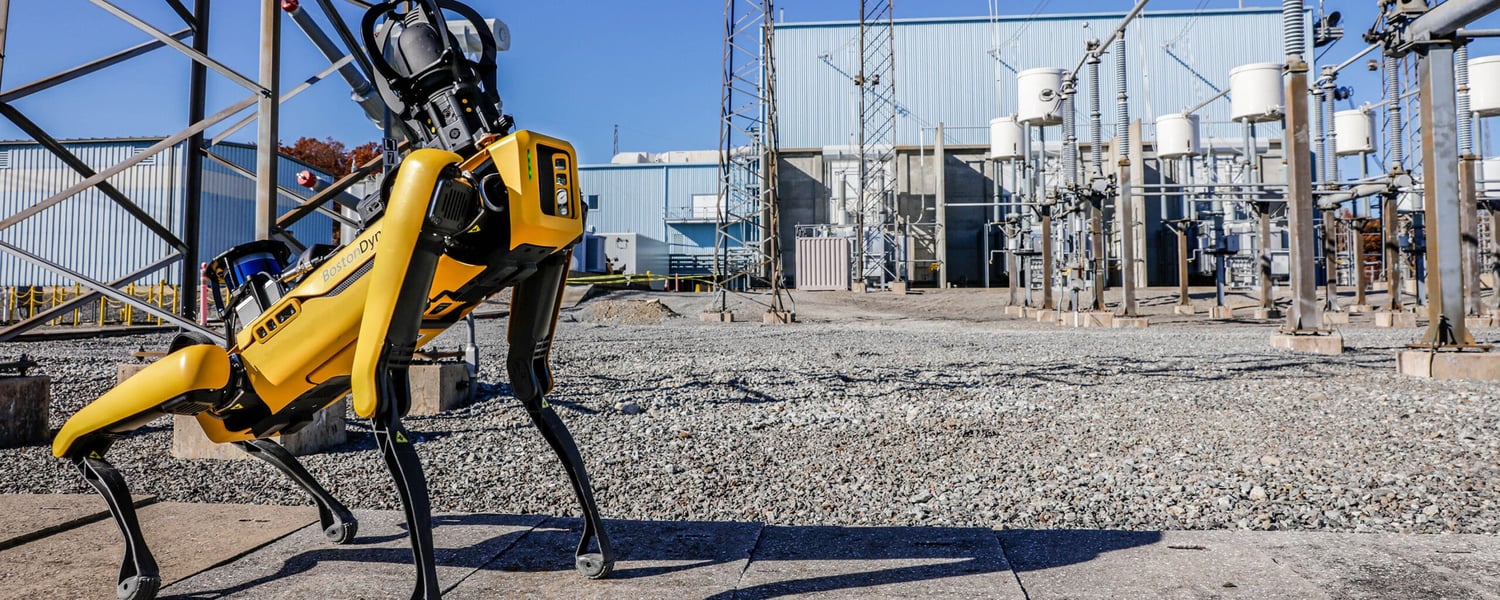 Boston Dynamics SPOT quadruped robot with thermal camera attachment deployed in an industrial environment