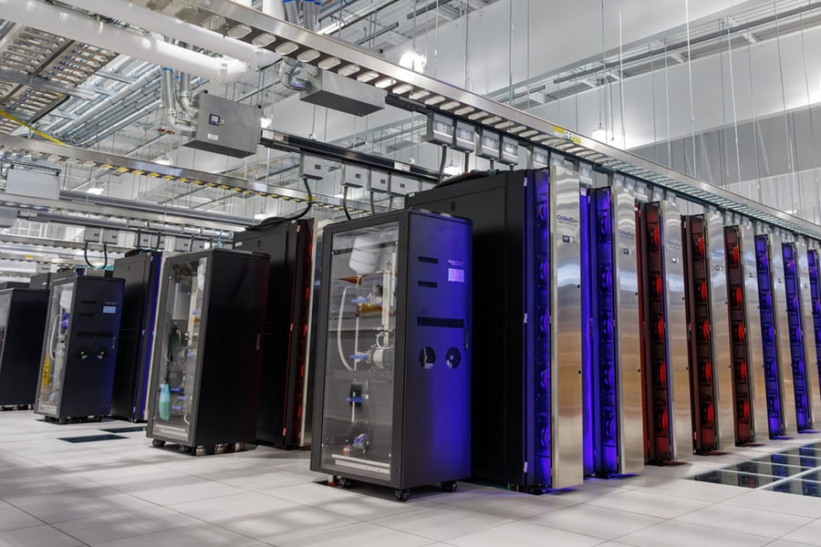 Server racks and infrastructure inside a data center facility at Sandia National Laboratories