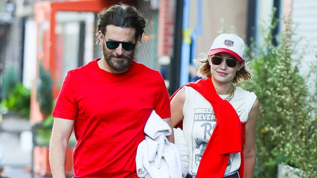 Gigi Hadid and Bradley Cooper walking together in Paris August 2026