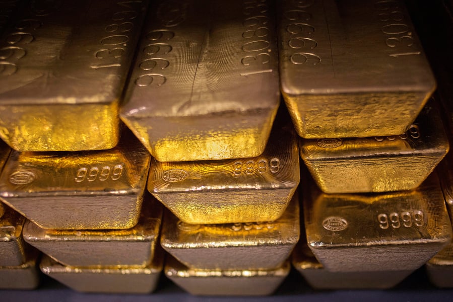 Stacked gold bars at a mint vault, the bullion behind the gold rate today of Rs 16,309 a gram for 24K
