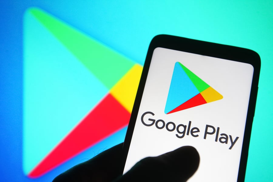 Google Play Store logo on a smartphone screen showing Android app marketplace