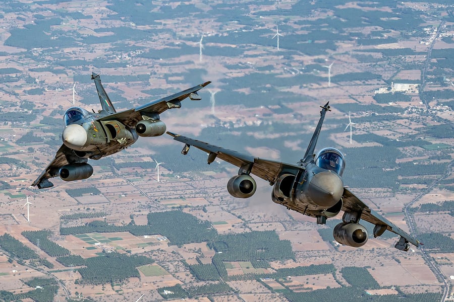 HAL Tejas fighters of No 45 Squadron Flying Daggers manoeuvring in formation, the aircraft at the centre of the Hindustan Aeronautics order book