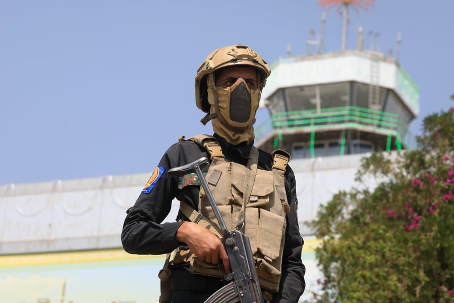 Armed Houthi fighter on patrol at Sanaa International Airport in Yemen