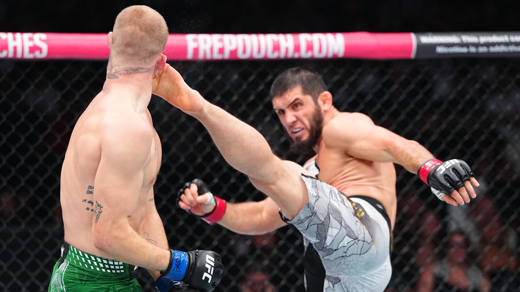 Ian Machado Garry facing Islam Makhachev during their UFC 330 lightweight championship fight