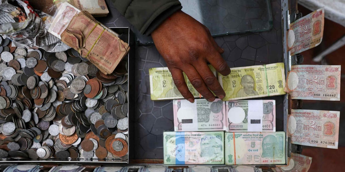 Indian rupee notes and dollar exchange rate, the currency variable behind August FPI inflows