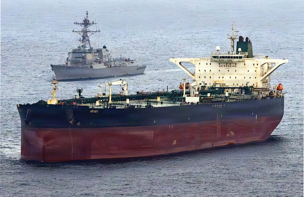 Ships navigate the Strait of Hormuz as Iran’s closure of the waterway continues amid the regional conflict
