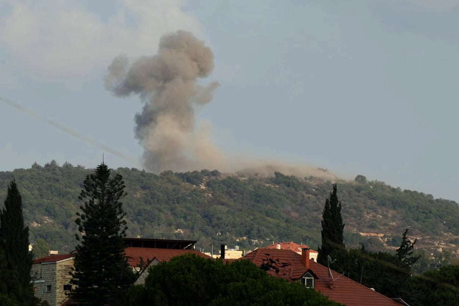 Smoke billows from the mountainous Ali al-Taher Ridge in southern Lebanon after Israeli air strikes hit positions in the Nabatieh district