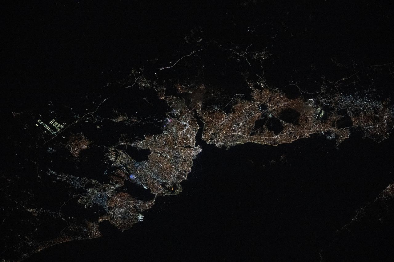 Istanbul city lights at night showing the Bosphorus Strait connecting the Sea of Marmara to the Black Sea photographed from the International Space Station