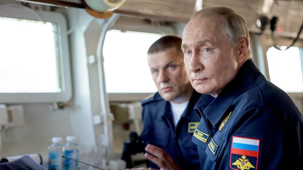Russian President Vladimir Putin chairs a security meeting as Russia warns Japan that its drone investment in Ukraine constitutes a hostile act against Moscow