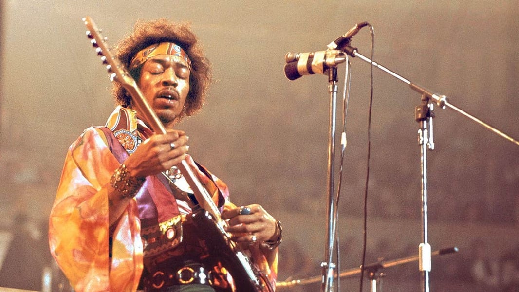 Jimi Hendrix performing on stage, photographed in 1970 before his death at 27