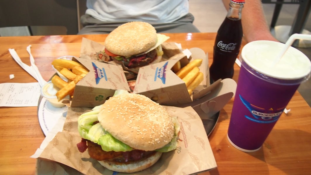 Assortment of ultra-processed junk food snacks including chips and sugary drinks linked to higher prostate cancer risk