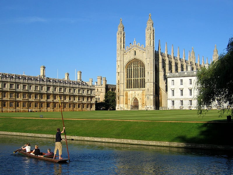 West end of King's College Chapel seen from The Backs Cambridge with punters on the River Cam and Clare College Old Court visible on the left