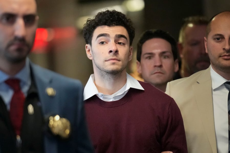 Luigi Mangione escorted into Manhattan Criminal Court for arraignment on state murder and terror charges December 2024