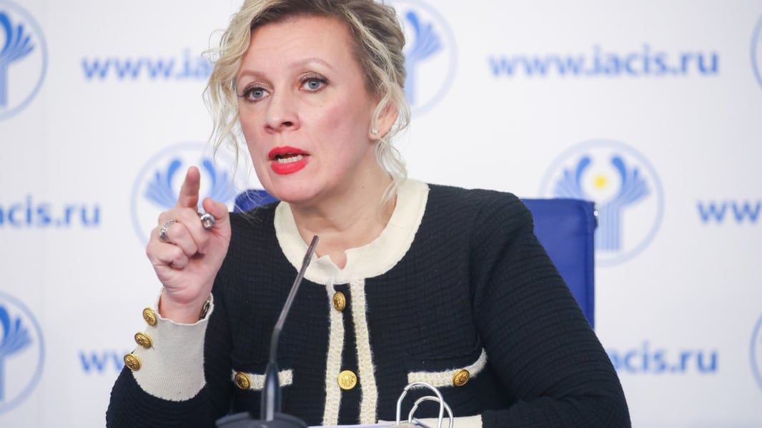 Russian Foreign Ministry spokeswoman Maria Zakharova gestures while speaking at a press briefing