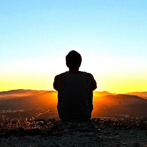 Person practicing meditation, illustrating mindfulness techniques studied for gene expression and inflammation effects