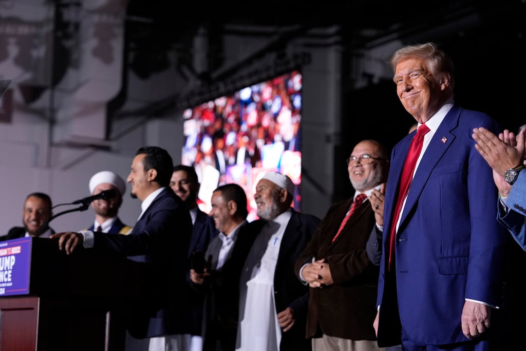 Former President Donald Trump meets with Muslim community leaders at a Novi Michigan campaign rally in October 2024, a gathering that preceded mass Arab-American protest votes against Kamala Harris