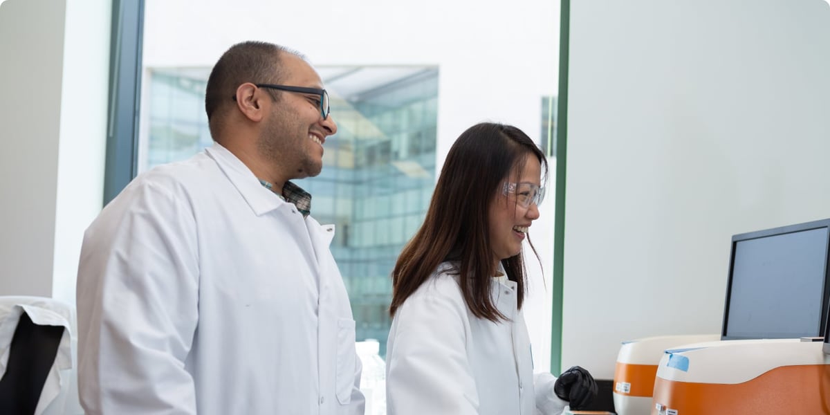 Moderna researchers working on mRNA cancer vaccine development in laboratory