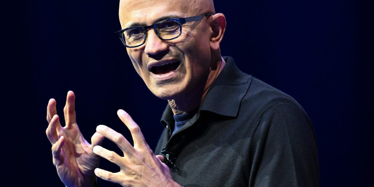 MSFT stock today: Microsoft chief executive Satya Nadella speaking on stage as Azure passes 100 billion dollars in annual revenue