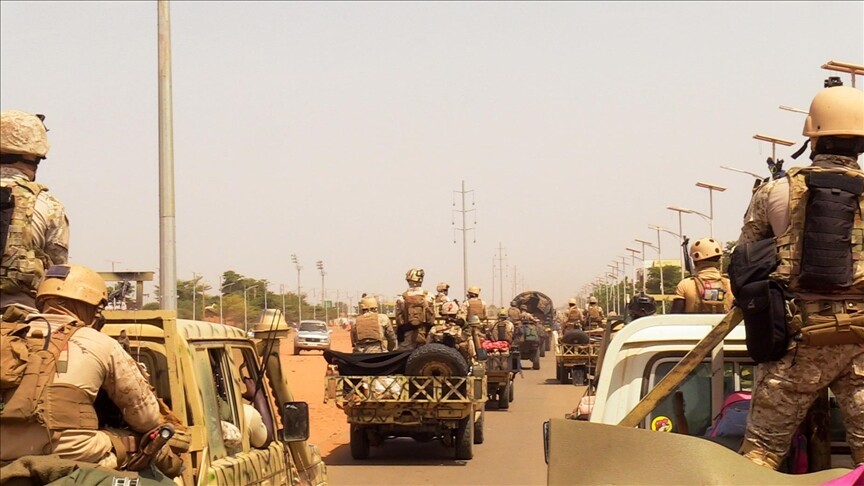 Niger military security forces in armored vehicles patrolling Niamey after the coup