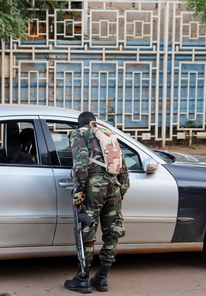 Niger soldiers at a Niamey checkpoint after Russia's Africa Corps helped the junta suppress a soldier mutiny 2026