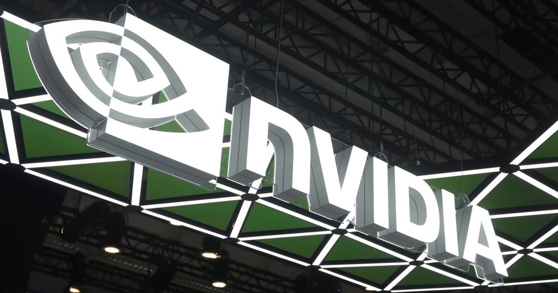 NVDA stock today: illuminated Nvidia signage at the Computex technology exhibition in Taipei, Taiwan, where prosecutors have indicted nine people over AI server exports to China