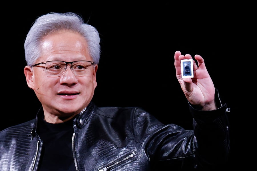 Nvidia CEO Jensen Huang at the Computex 2026 keynote as markets await quarterly earnings