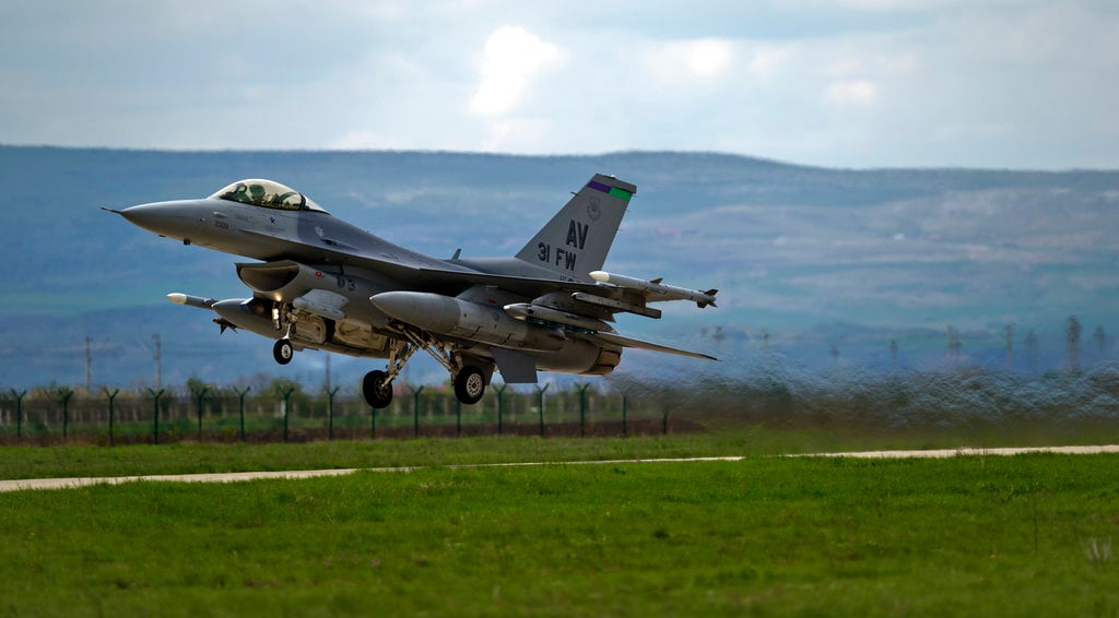 A US-made F-16 fighter jet taking off from the air base at Campia Turzii, Romania