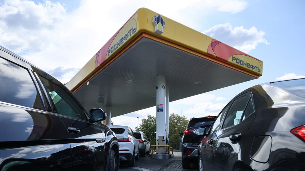 Cars lined up at a Rosneft petrol station in Moscow during Russia's fuel shortage as petrol availability collapsed to 28 percent of stations nationwide