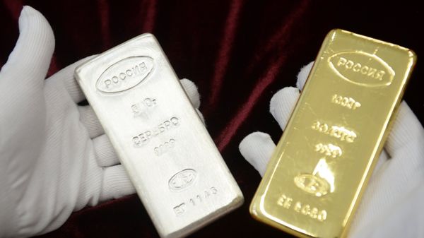 Gold and silver bullion bars representing precious metals spot price movement on August 29 2026